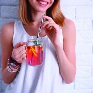 woman drinking lemonade