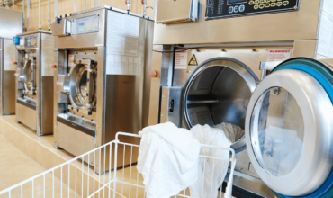 Modern commercial laundry equipment.
